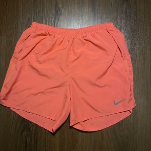 Nike 4” Inseam running shorts, small, coral